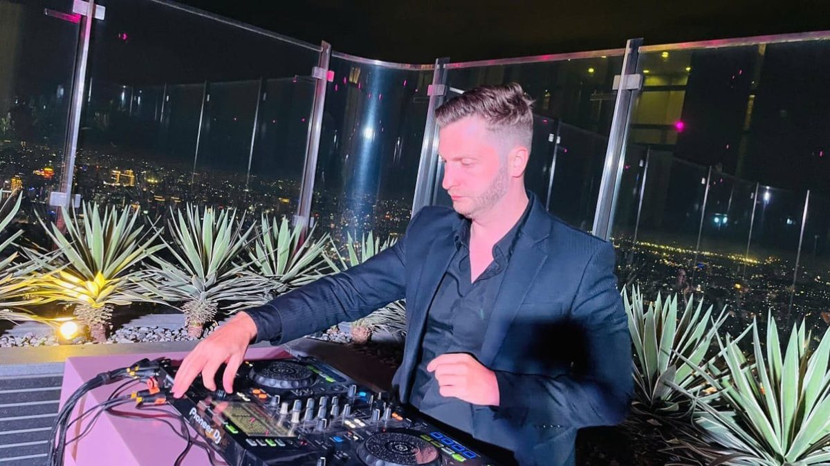 Determind DJing the YSL Beauty rooftop set